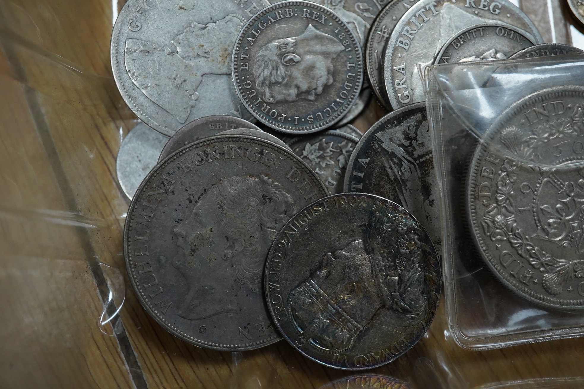 A quantity of British, Dutch, South Africa etc silver coins, 19th- early 20th century, to include a George V crown 1930, about EF etc.